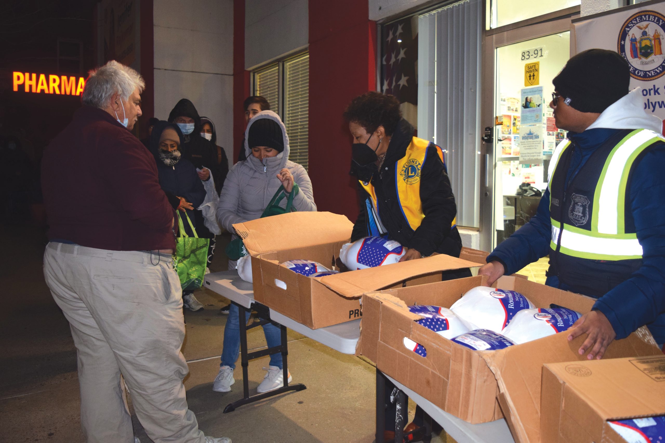 Locals gather in Woodhaven for turkey giveaway